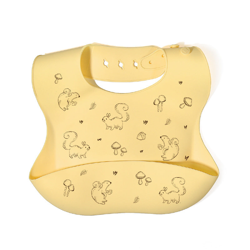 Yellow baby bib with animal illustrations on a white background