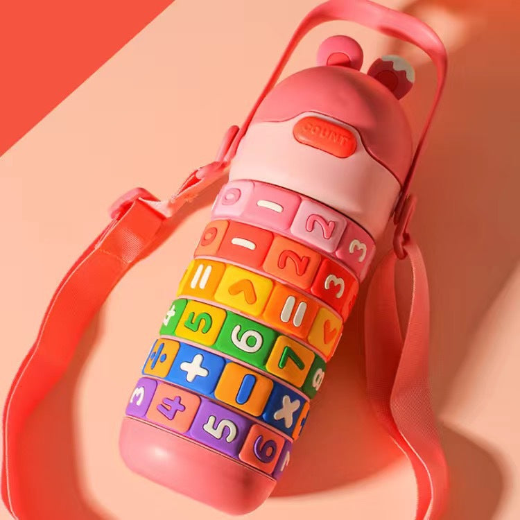 Colorful water bottle with number and letter patterns on a pink background