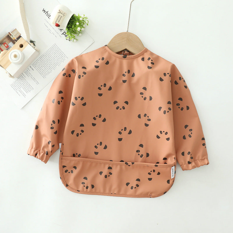 Brown bib with black patterns on a white background