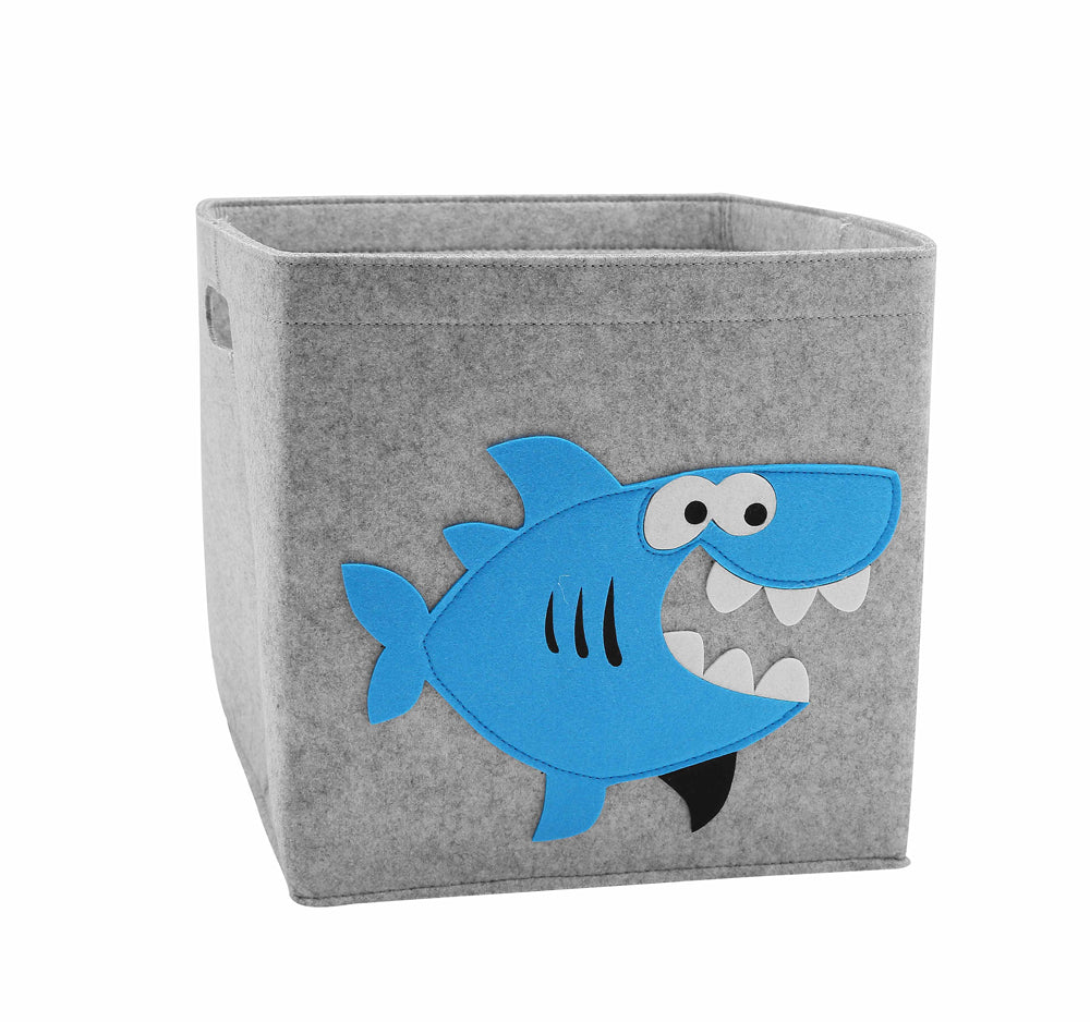 Gray storage cube with a blue shark design on a white background