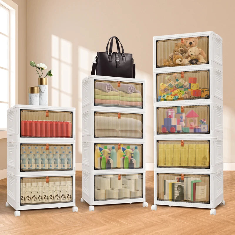 White storage cabinets with transparent drawers containing various items on a wooden floor.