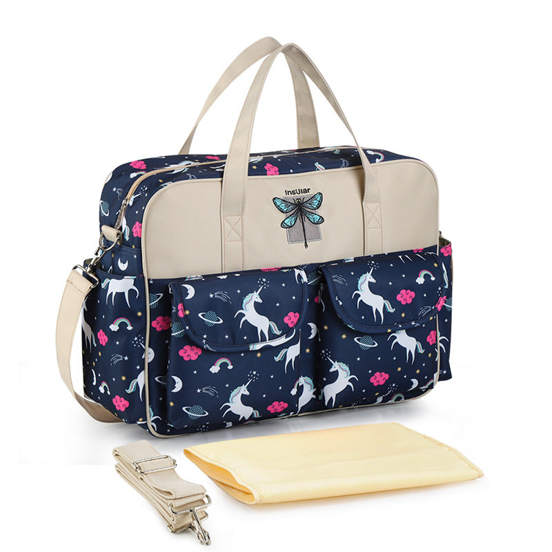 Navy blue diaper bag with unicorn pattern and beige accents, featuring the brand 'Insuilar'.