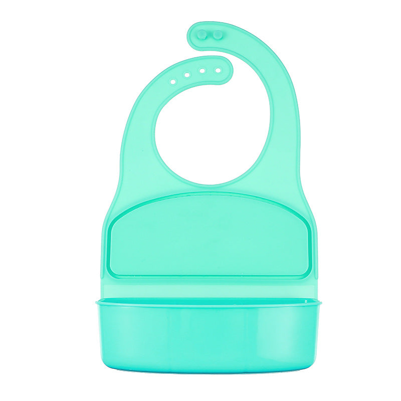 Turquoise baby bib with attached food container on a white background