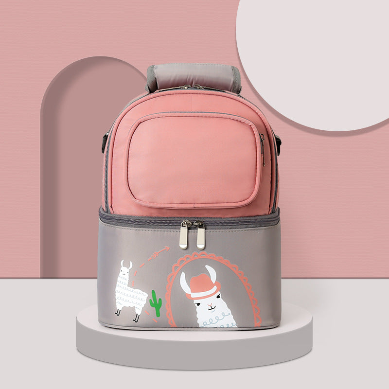 Pink and gray insulated travel bag with llama design on a pink background