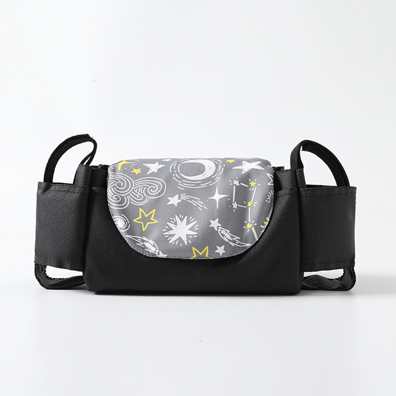 Black bag with a gray pattern featuring stars and celestial designs on a white background