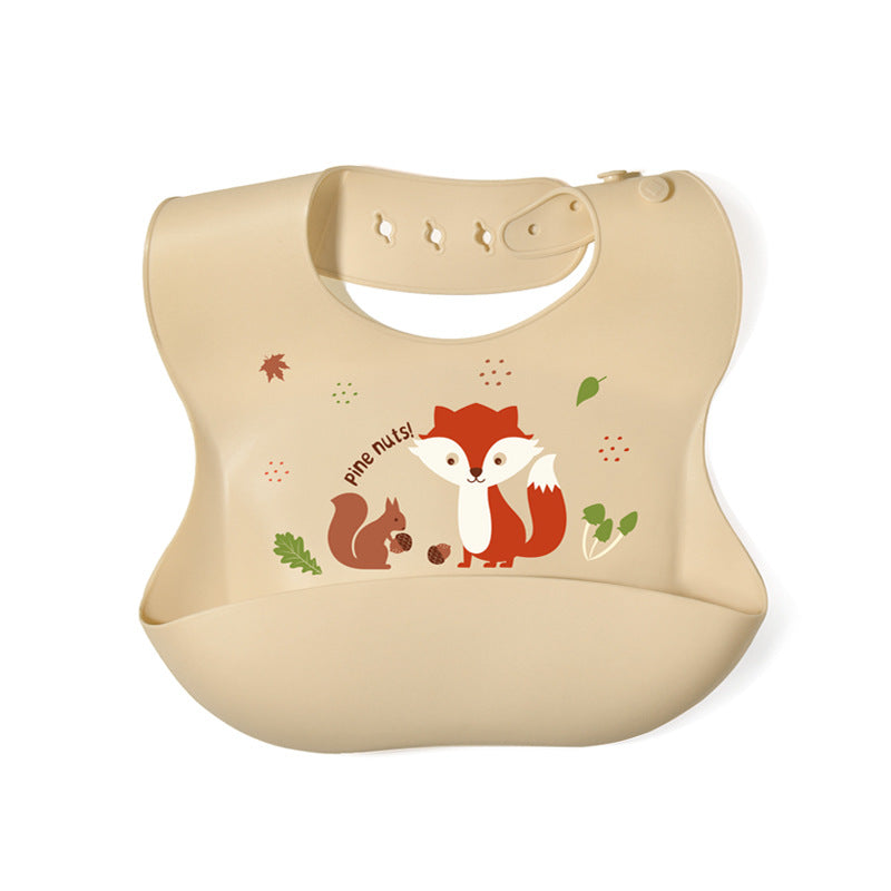 Beige bib with fox and squirrel illustrations on a white background