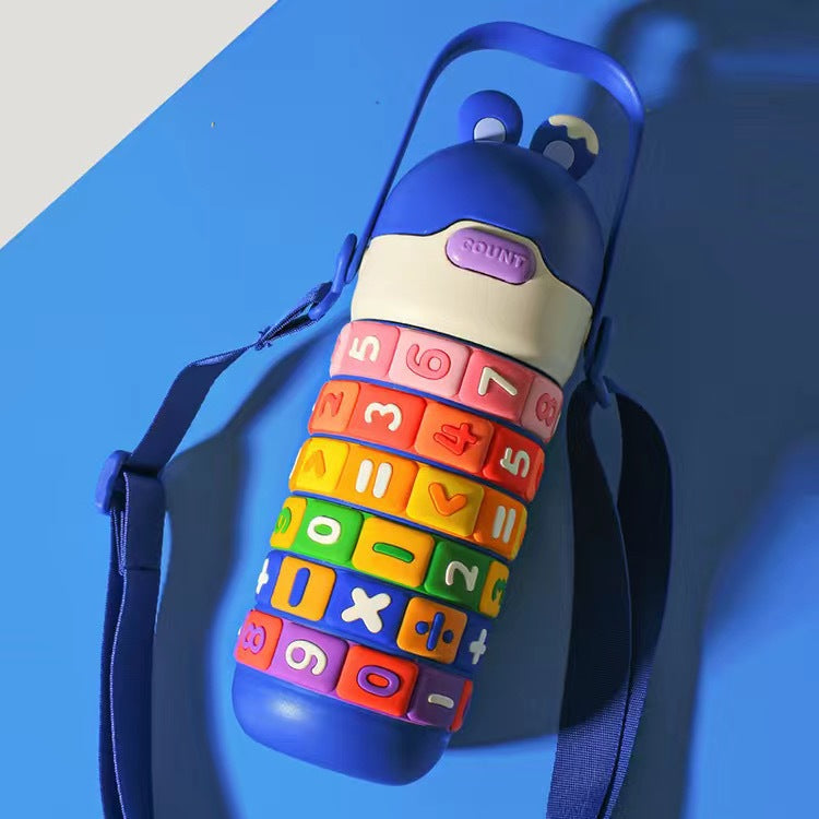 Colorful educational water bottle with number and letter patterns on a blue background