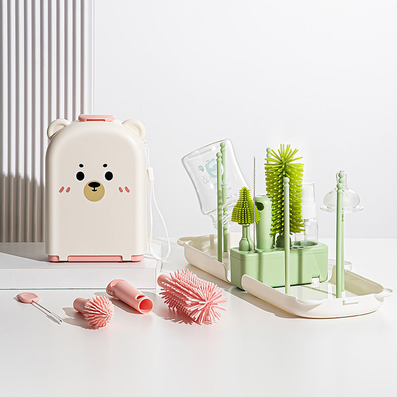 Dishwasher safe cleaning brush set with a bear-shaped container on a white surface.