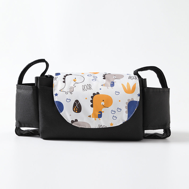 Black diaper bag with dinosaur pattern on a white background
