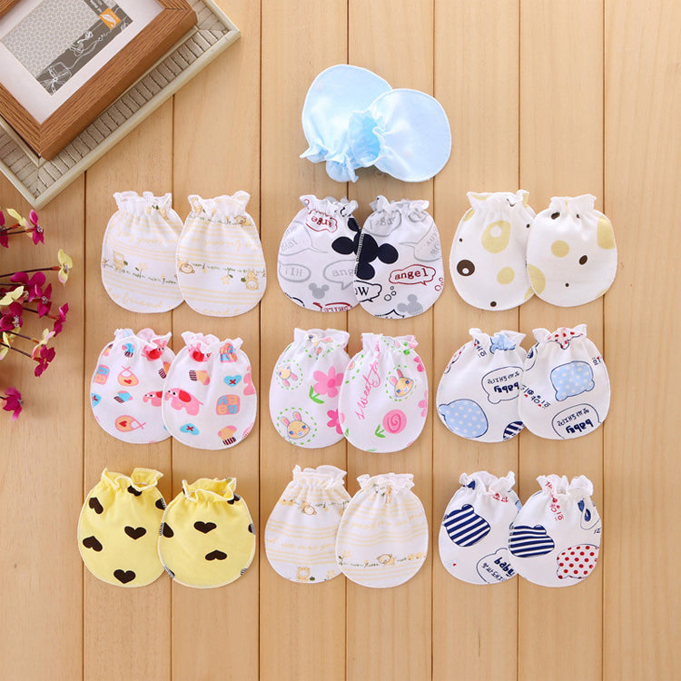 Collection of small bags with various designs on a wooden surface